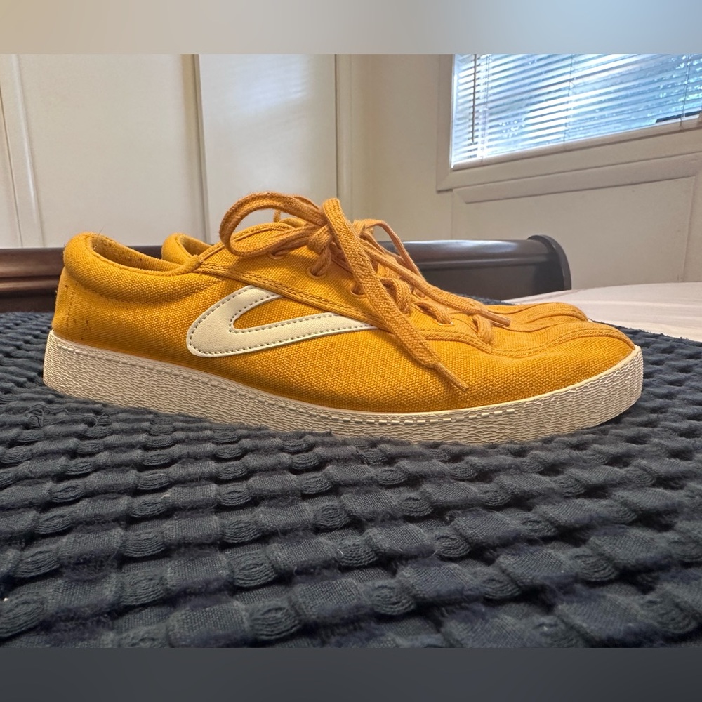 Yellow Tretorns size 10